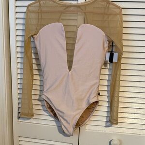 Chic Mesh Bodysuit in tan and soft pink .
